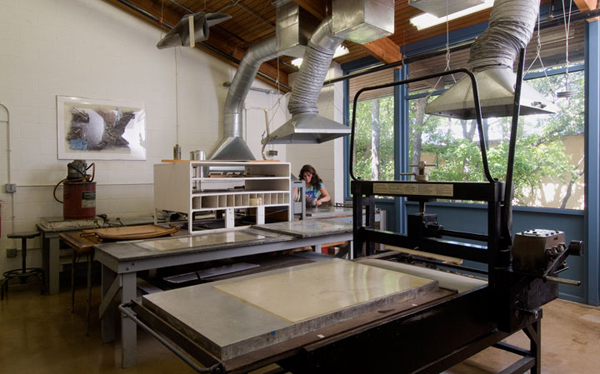 Student by litho printing machine