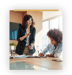 two women in conference room