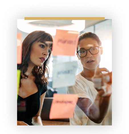 live collaboration with 2 women and sticky notes