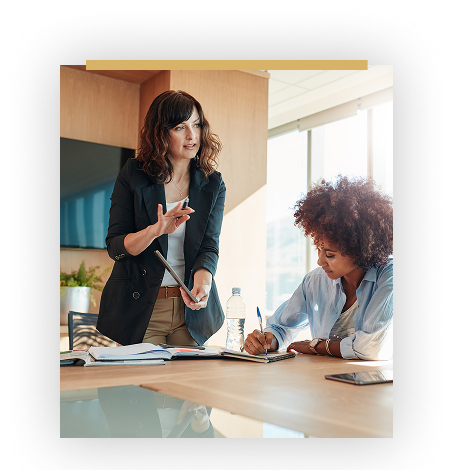 two women in conference room